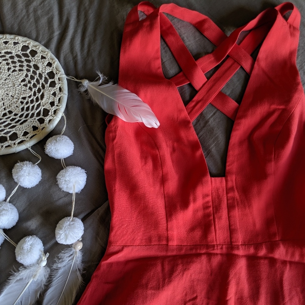 Beautiful open back dress by
NBD x Naven Twins